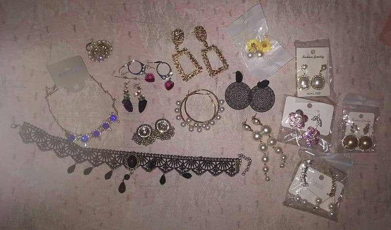 earrings, necklaces, and a ring for sale at low price 1