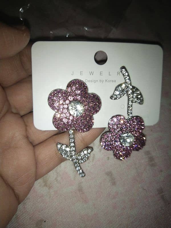 earrings, necklaces, and a ring for sale at low price 3