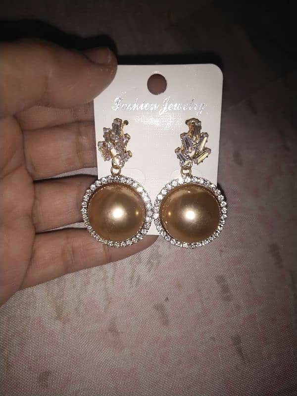 earrings, necklaces, and a ring for sale at low price 4