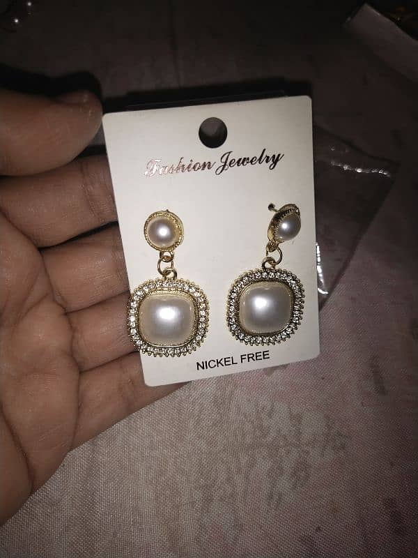 earrings, necklaces, and a ring for sale at low price 5