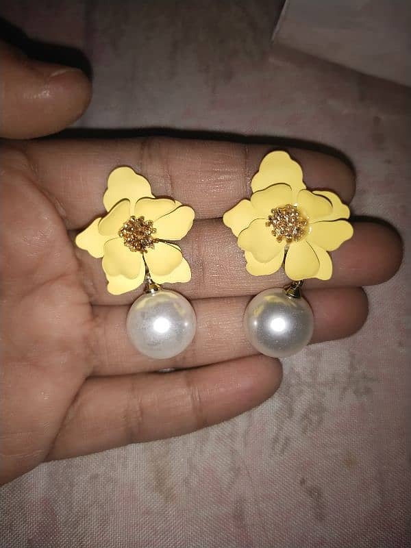 earrings, necklaces, and a ring for sale at low price 6