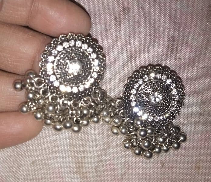 earrings, necklaces, and a ring for sale at low price 9