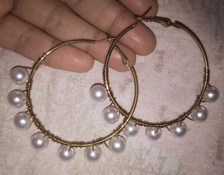 earrings, necklaces, and a ring for sale at low price 11