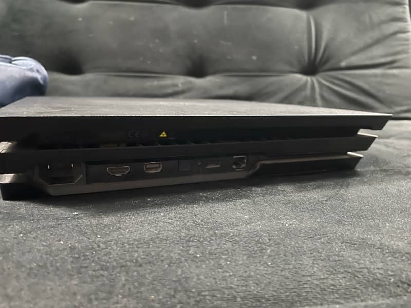 PS4  PRO 1TB Black with CDs and 3 controllers 2 original 1 fake 2