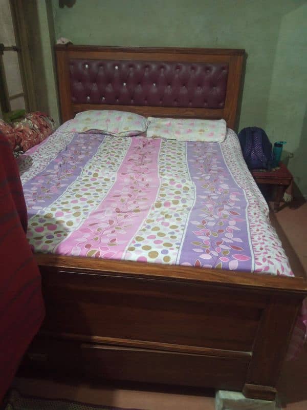 wooden bed are sale in good condition 0