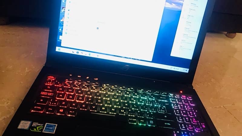 Asus gaming laptop with RGB keyboard and asus orignal charger 3