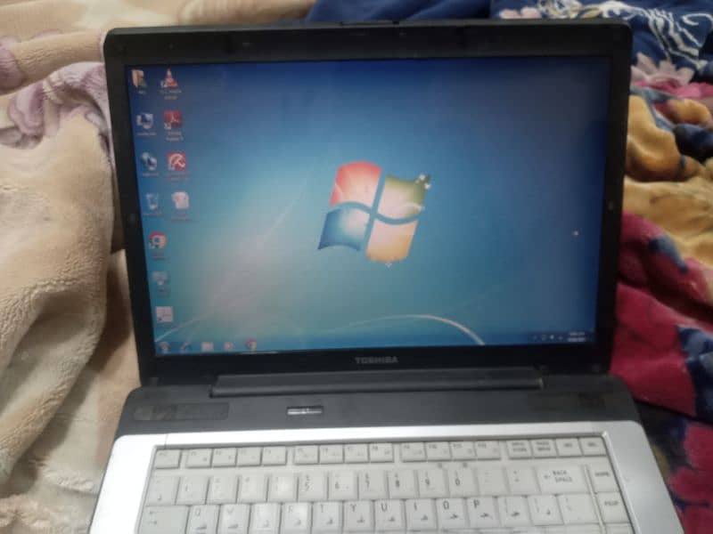 Toshiba pentium dual core inside satellite with charger good condition 7