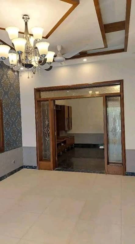 10 marla new tile floor 5bed double story house for rent in wapda town 4