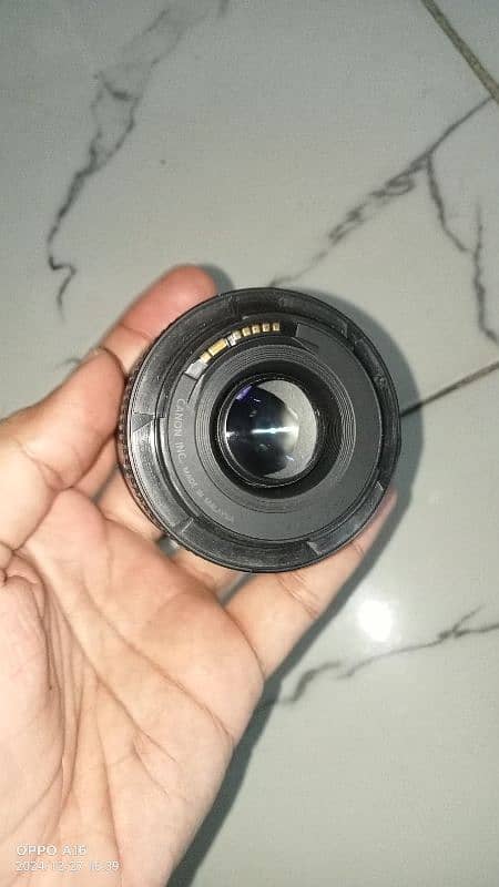 Canon 50mm F1.8 with glass 2