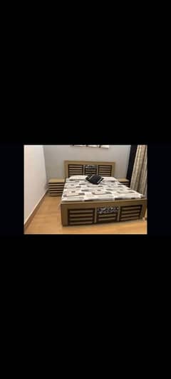 wooden bed with 2side tables and mirror.