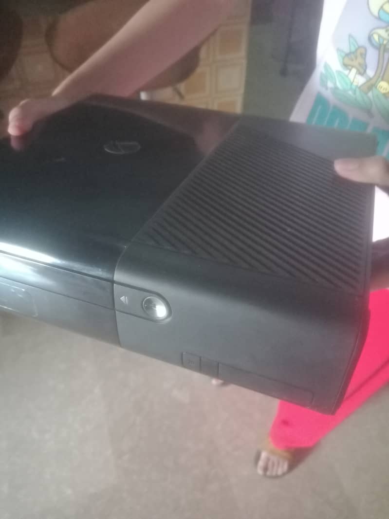 Xbox 360 with cds for sale in good condition. 5