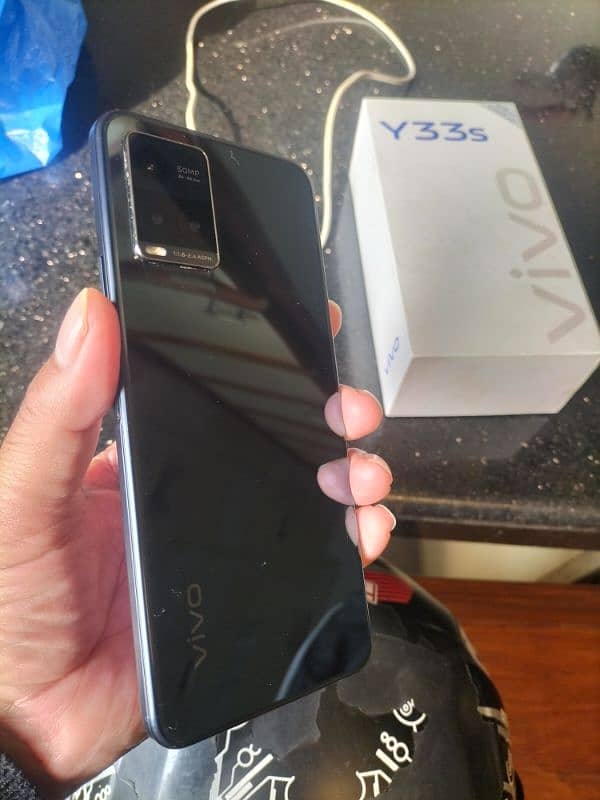 Vivo y33s  8+4/128 with box and original charger 1