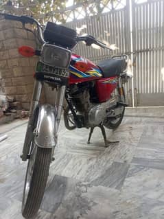 Honda 125 model 2018 Lahore registered all documents complete.