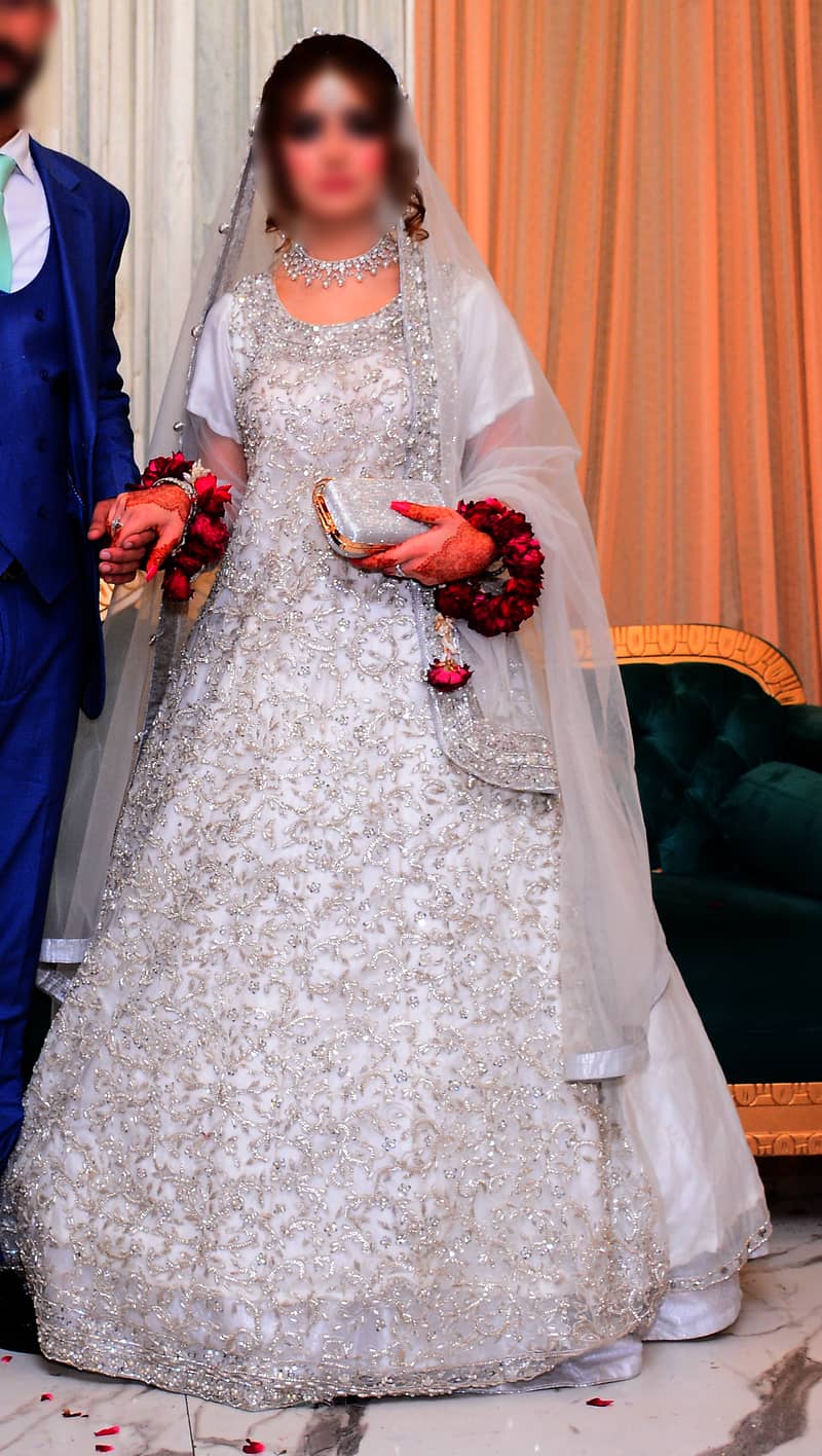 Bridal Perfection: White Frock Maxi with Lehenga for a Reception. 2