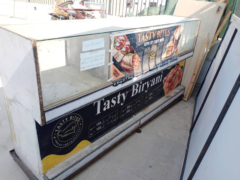 Chinese food counter. biscuit shelf. wood counter. 0