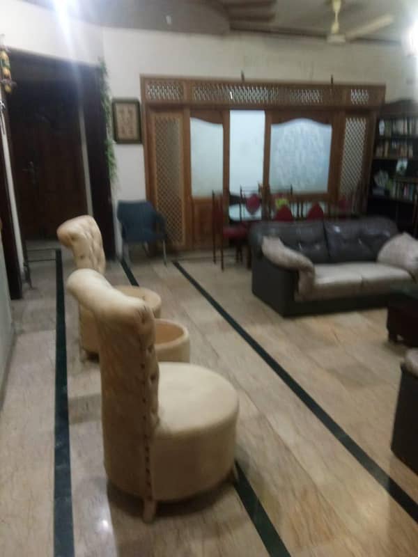 Lahore City offers 10 Marla Single story house for sale Wapda town Phase 1 Corner Facing park Near Market 15