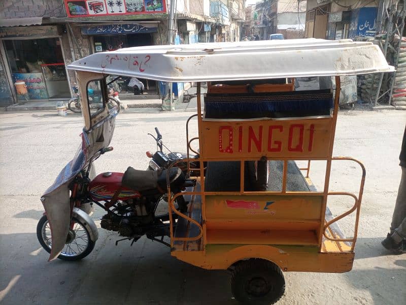 I am selling my QINGQI 100cc rickshaw condition 10/8 12