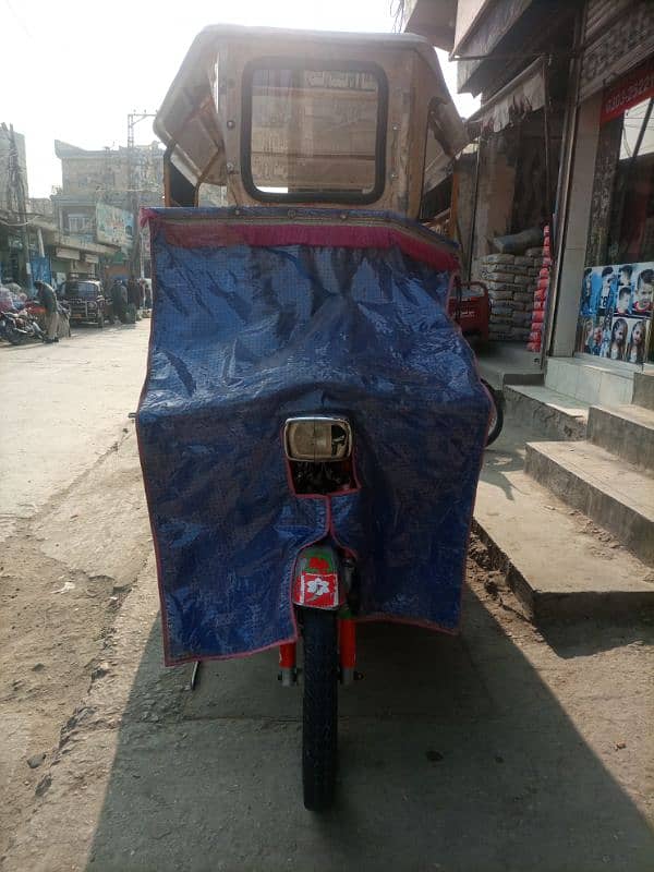 I am selling my QINGQI 100cc rickshaw condition 10/8 14