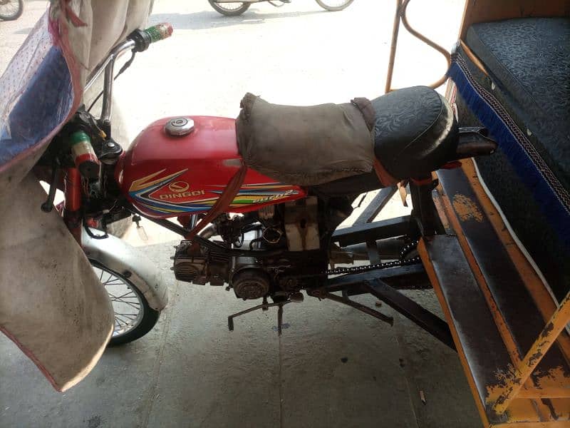 I am selling my QINGQI 100cc rickshaw condition 10/8 15