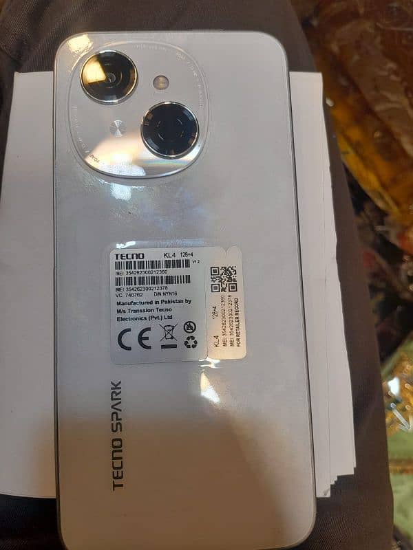 new hay mobail tecno spark go 1 (4.128) hay full box kay sath 2