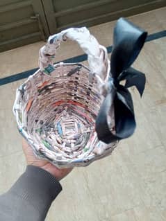 Home made basket made of newspaper sheets