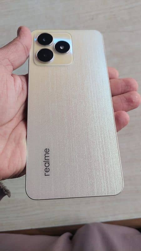 Realme C53 6.128 Gold color 1