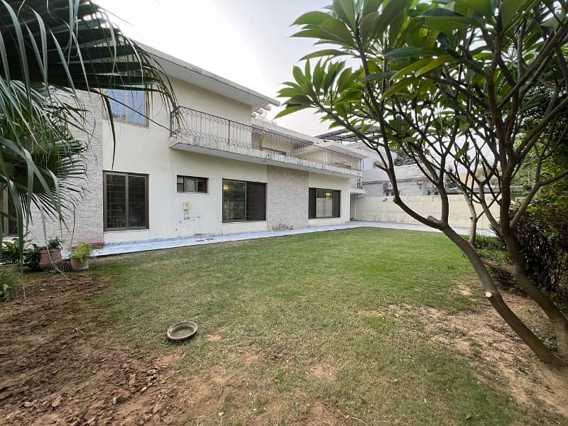 Beautiful independent Ground portion unfurnished 4Bed with big lawn 24