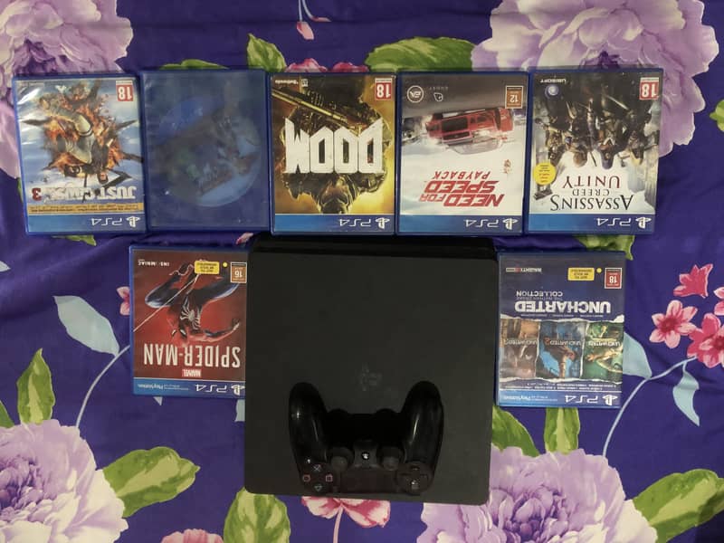 Playstation 4 Slim, 2 Controllers and 7 Games 0