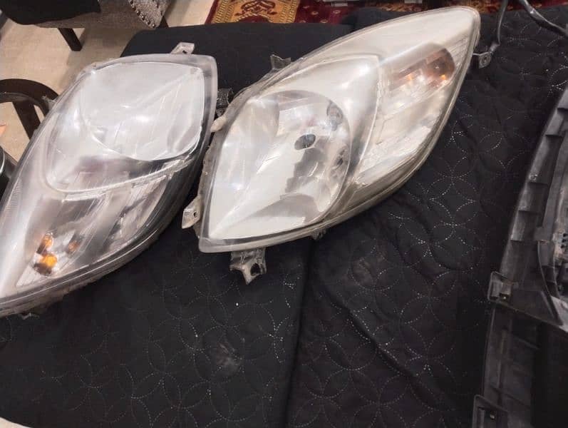 vitz 2007 model headlights with viper sheild 2