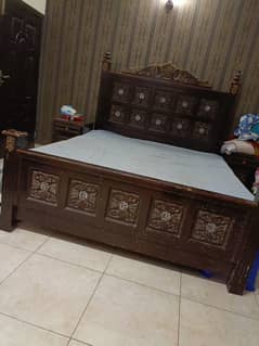 king size bed with dessing and side table