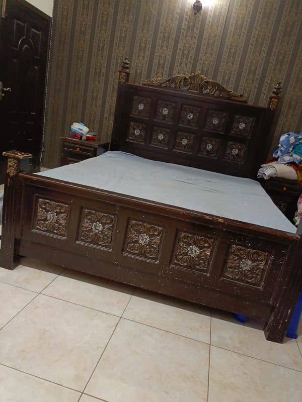 king size bed with dessing and side table 0