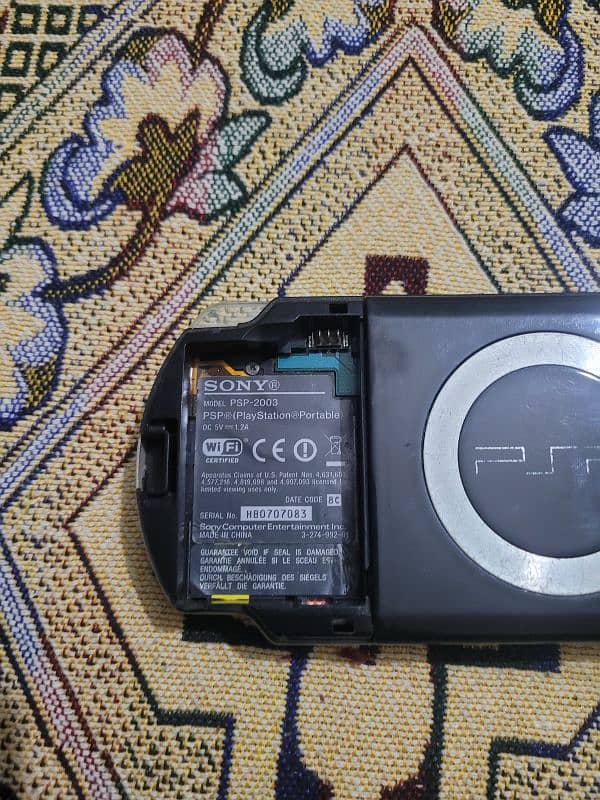 PSP 2003 in working condition. 1