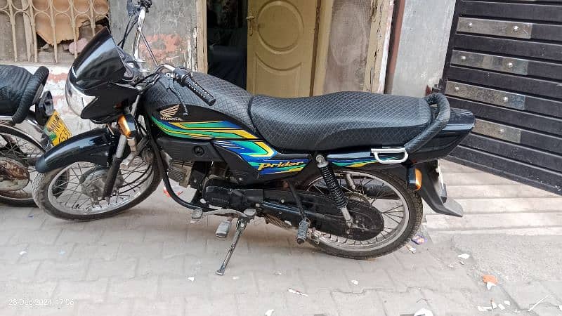 Honda pridor 100 cc blaik 2022- 2023 model Punjab no 1