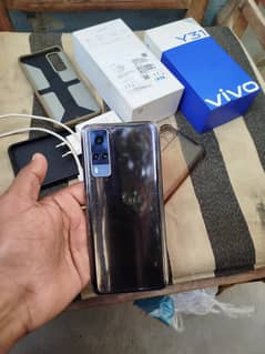 Vivo Y31 with accessories