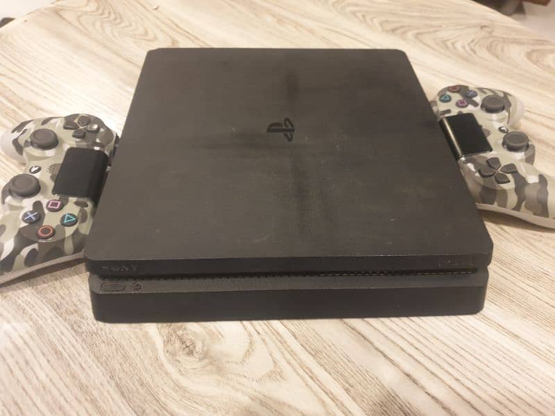 PS4 Console 500GB slightly used good condition with 2 controllers 1