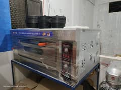 Oven and Haier Inverter Deep Freezer and All pizza equipments for sell