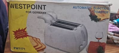 Automatic Electric Toaster  . .  brand new condition