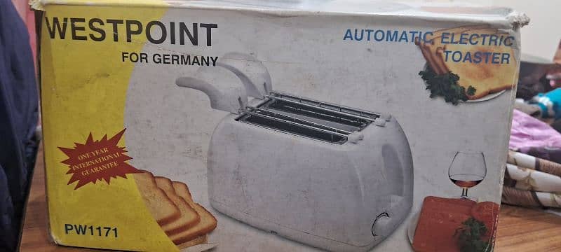 Automatic Electric Toaster  . .  brand new condition 0