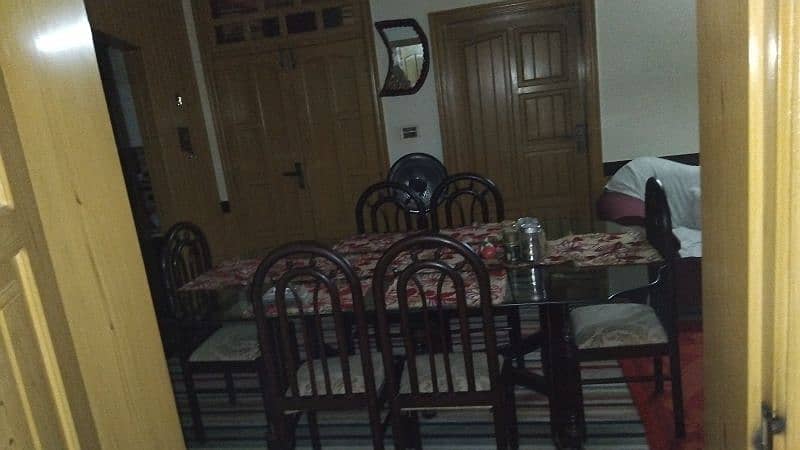 wooden dining table glasses mirror and 8 chairs 1