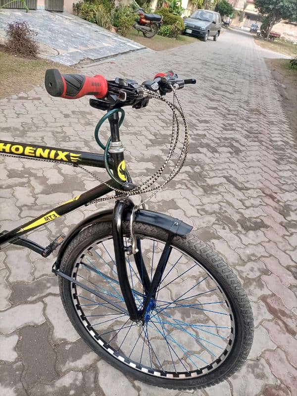 PHOENIX ALMOST NEW 26 INCH BICYCLE FOR SALE IN GOOD CONDITION ALL OK 7