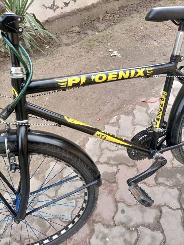 PHOENIX ALMOST NEW 26 INCH BICYCLE FOR SALE IN GOOD CONDITION ALL OK 11