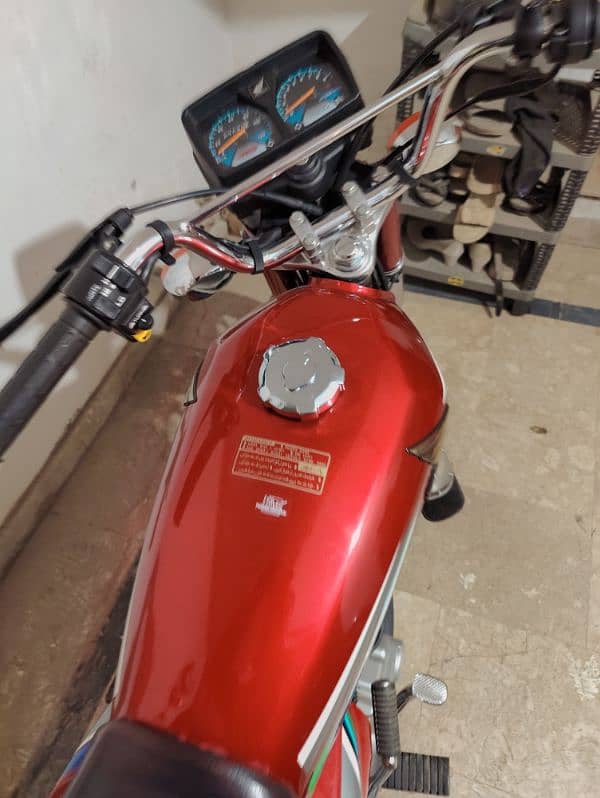 Honda 125   08/2023  RED 4