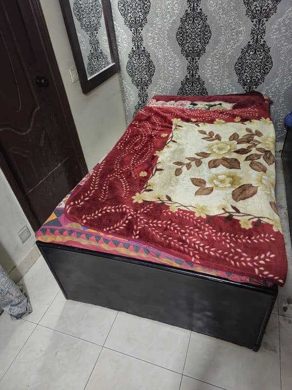 Single Wooden Bed inside storage 0