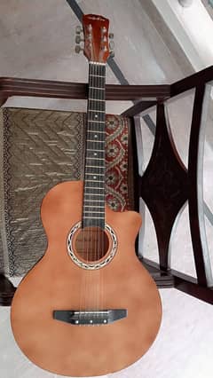 Acoustic guitar with capo