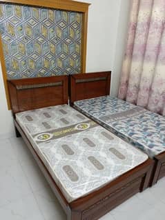 2 single bed with mattresses