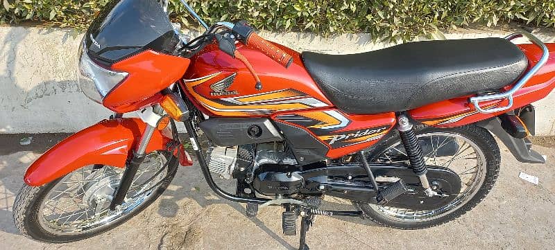 Honda pridor 100cc red colour registration all Punjab 7