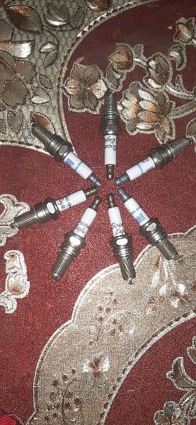 Honda 125 ,Important spark plugs, Made In  USA 1