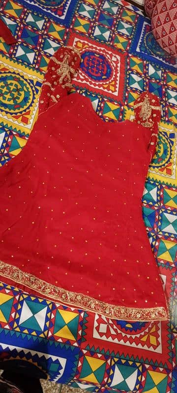 wedding lehnga red colour with golden stone work 4