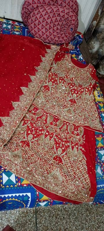 wedding lehnga red colour with golden stone work 7