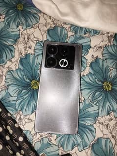 infinix note 40 with 2 original charger. wired+wireless